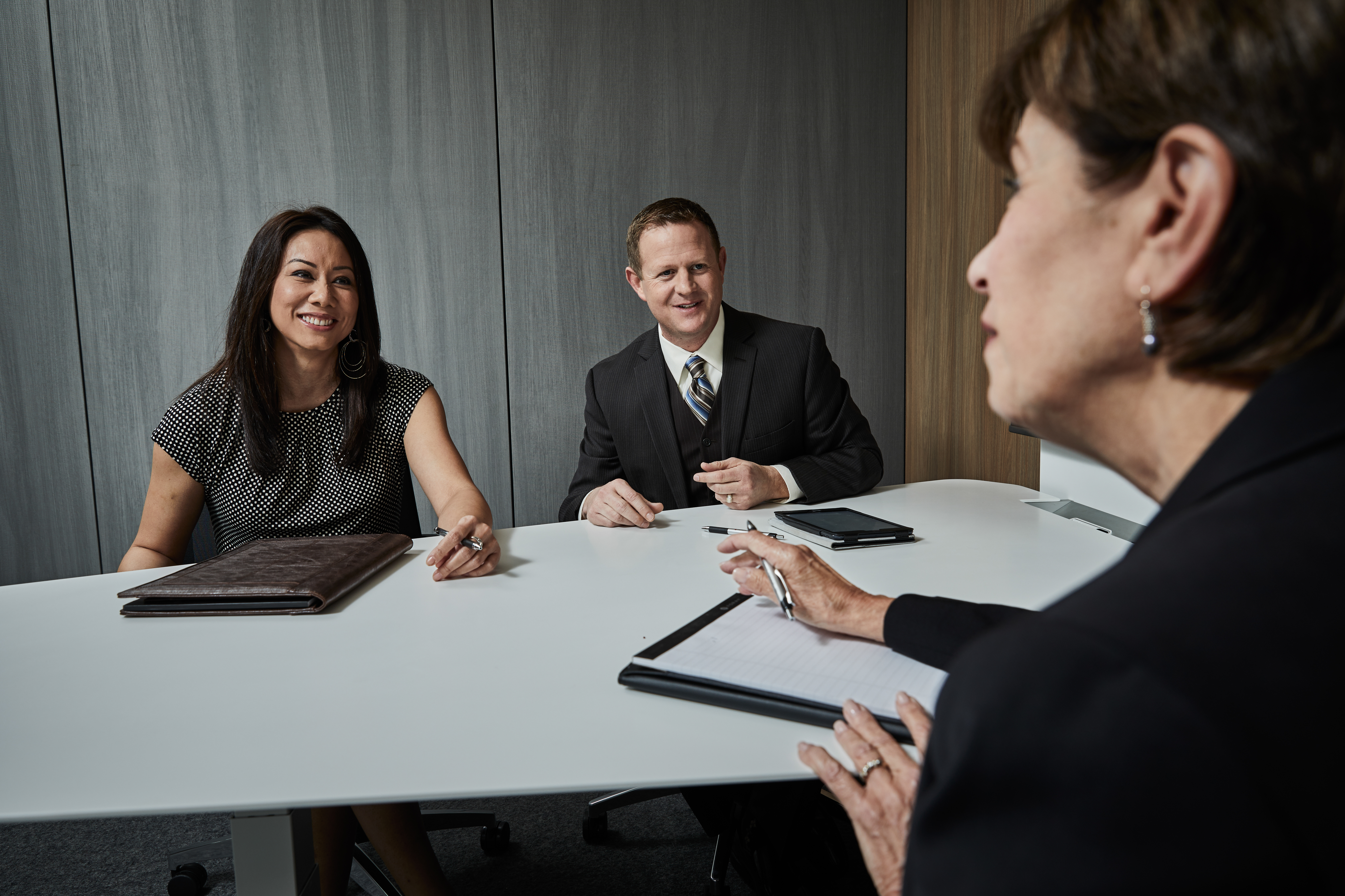 Associates meeting in a conference room