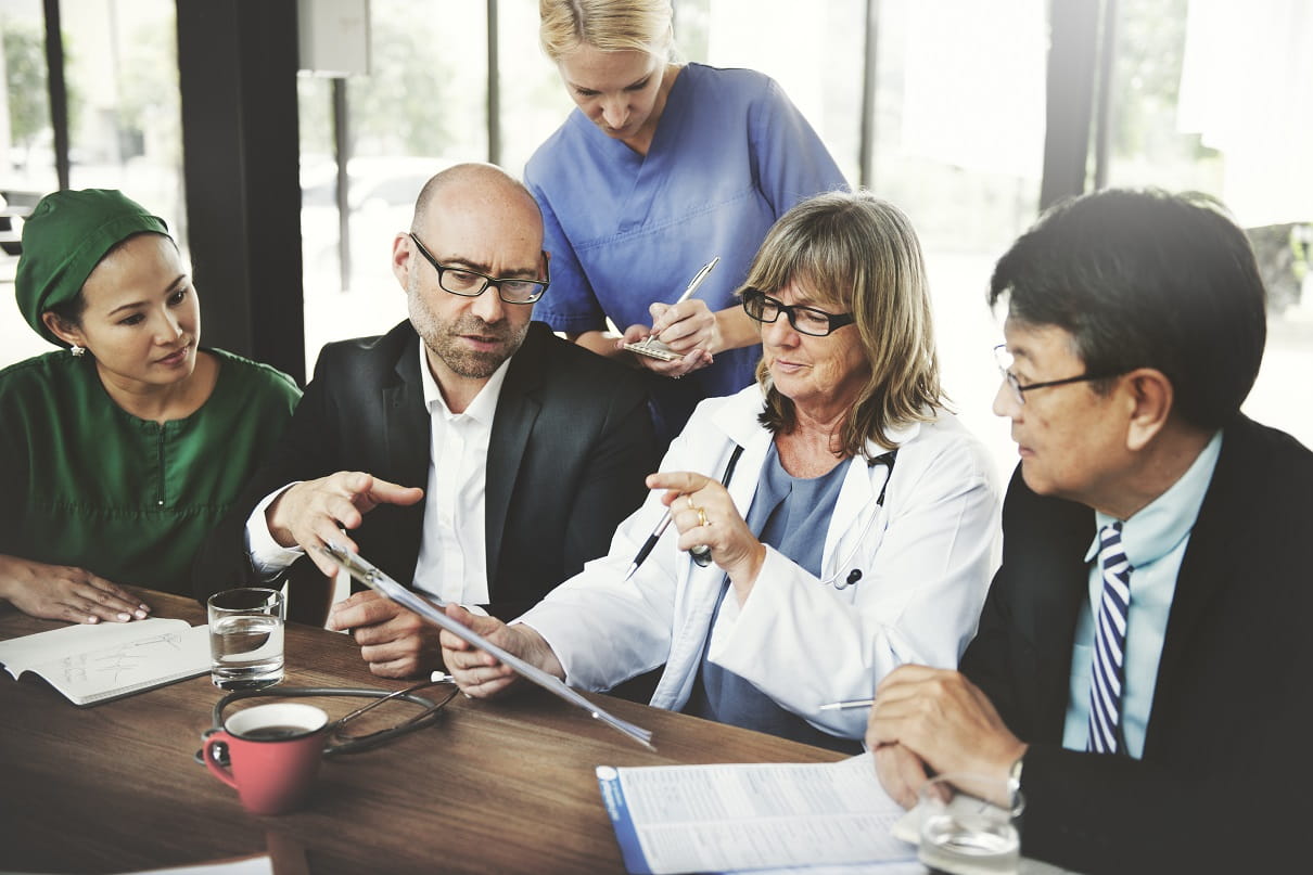 Group of associates and physicians talking